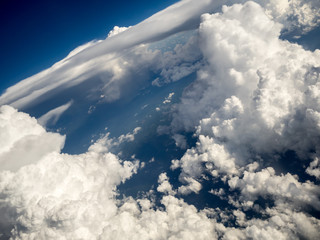 Large, Puffy Clouds from Above, Tilted Angle © MizC
