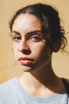 Closeup Portrait of a Beautiful Mixed Race Girl under the Sun