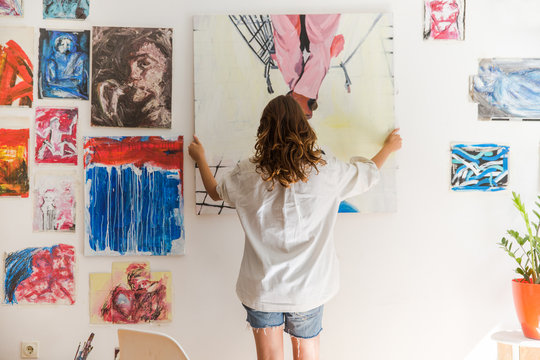 Artist working in her studio