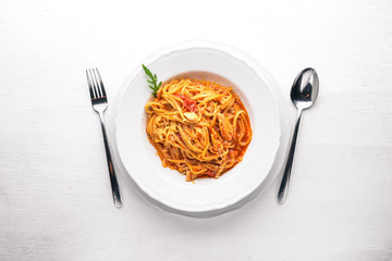 Ala Alio Pasta. On a wooden background. Top view. Free space for text.