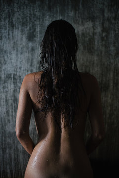 Back view of beautiful woman naked body after shower