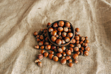 Fototapeta na wymiar Autumn harvest. Nuts on burlap.