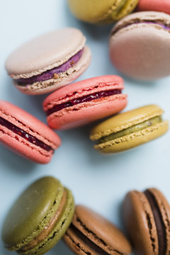 Colorful macaroons on a blue background