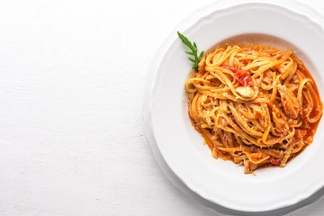 Ala Alio Pasta. On a wooden background. Top view. Free space for text.