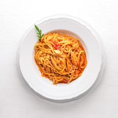 Ala Alio Pasta. On a wooden background. Top view. Free space for text.