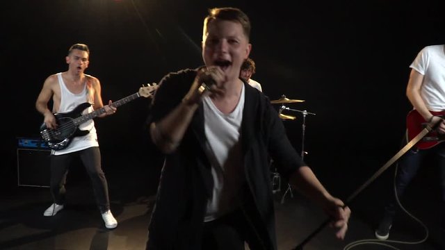 Slow-motion shooting of the male cover band