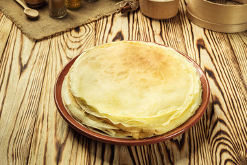 Stack of pancakes,One plain pancakes,Breakfast,snacks.Pancakes Day.Stack of kefir (buttermilk)...