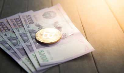 Uzbek banknotes and Bitcoin. Fifty Thousand Uzbek Sums