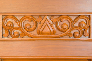 wooden door with carving of handmade close-up pattern