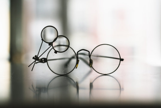 Glasses with magnifying glass