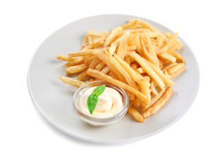 Plate with yummy french fries and sauce on white background