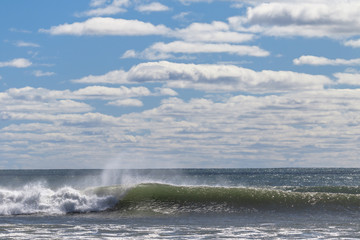Wave breaking in Cow Bay. Cow Bay is an unincorporated rural community within Halifax Regional Municipality Nova Scotia on the Eastern Shore 