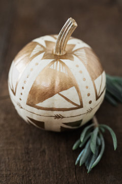 White Pumpkin Painted With Gold Geometric Shapes