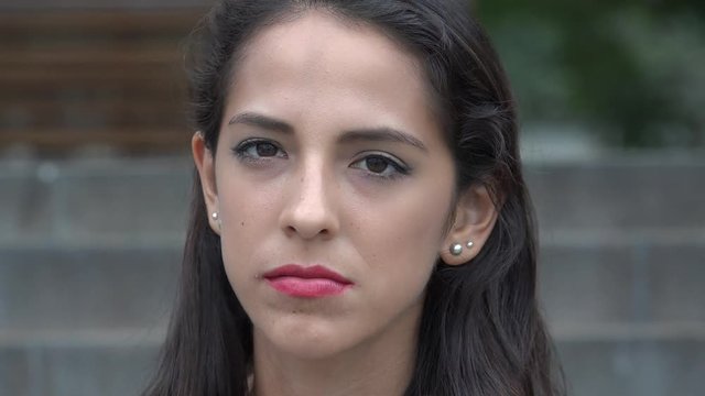 Unhappy Young Hispanic Woman