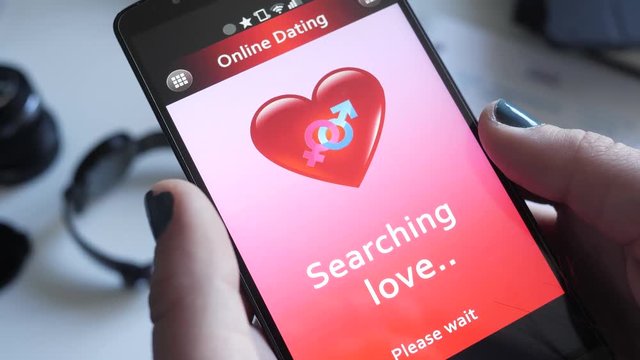 Girl using a dating app on her smartphone.