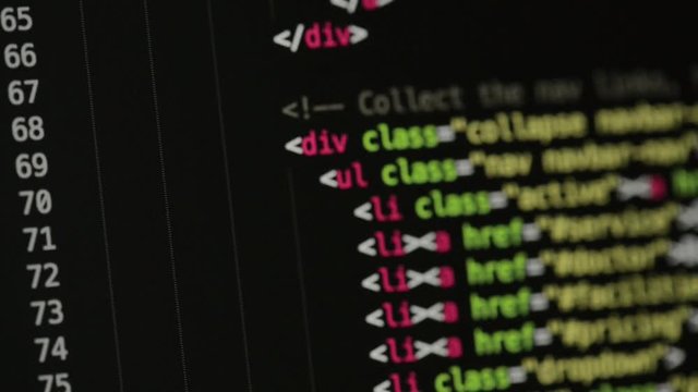 HTML and CSS code developing. Website design code programming on a laptop screen