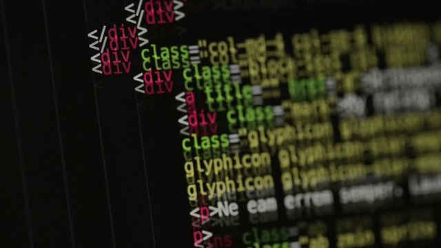 HTML and CSS code developing. Website design code programming on a laptop screen