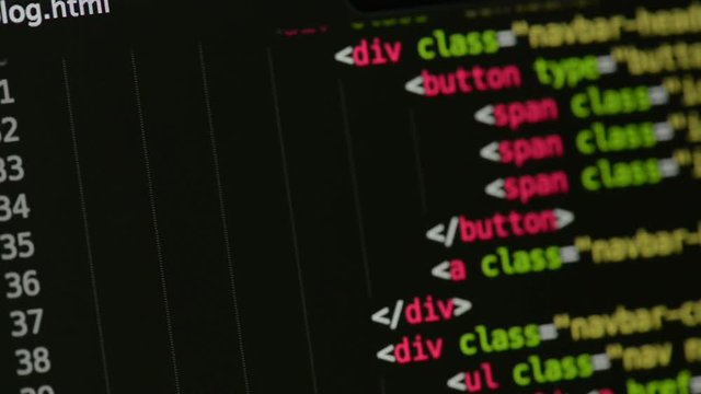 HTML and CSS code developing. Website design code programming on a laptop screen