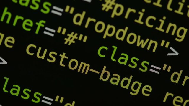 HTML and CSS code developing. Website design code programming on a laptop screen