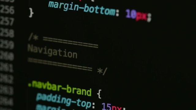HTML and CSS code developing. Website design code programming on a laptop screen