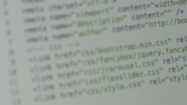 HTML and CSS code developing. Website design code programming on a laptop screen