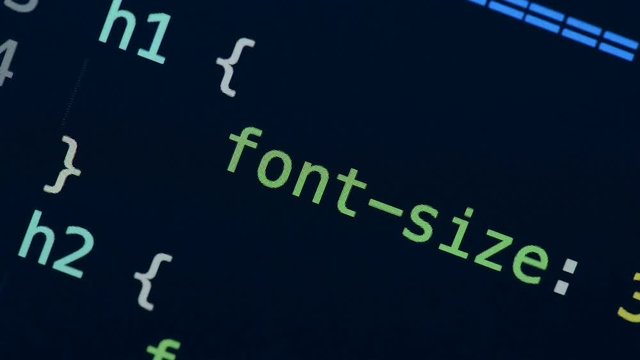 HTML and CSS code developing. Website design code programming on a laptop screen