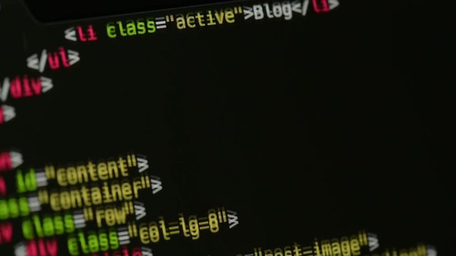 HTML and CSS code developing. Website design code programming on a laptop screen