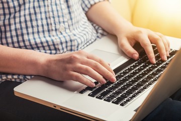 Fototapeta na wymiar Woman typing computer.