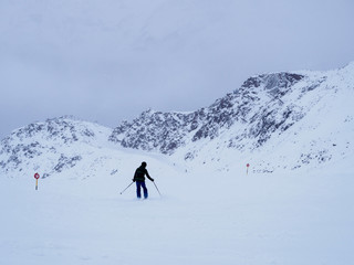 Skier and distand trail