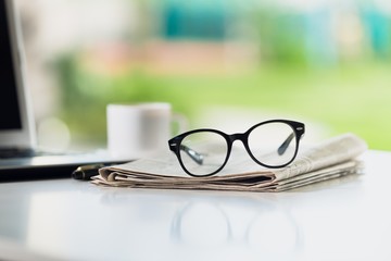 Glasses on tablet.