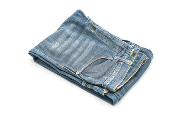 jeans folded on white background