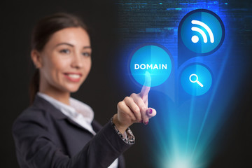 Young businesswoman working in virtual glasses, select the icon domain on the virtual display.