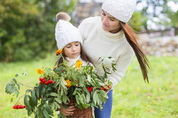 mother and daughter in the Park in autumn