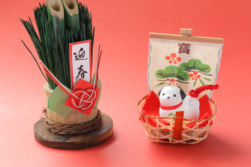 Japanese new year dog object on red
Note: Japanese words of this photography mean "treasure" and "spring welcoming"