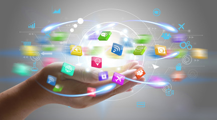 Application icons interface on hand. Social media concept