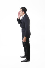 Portrait of Asian Man in Isolated Background With Gesture Sign