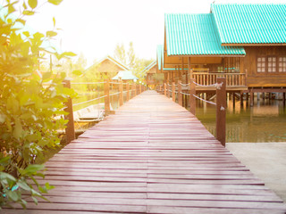 Wooden way with  home stay on lake