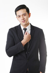 Portrait of Asian Man in Isolated Background With Gesture Sign