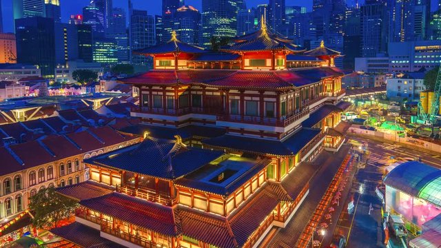 Aerial view video time lapse of Buddha Tooth Relic Temple & Museum in Singapore at night