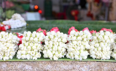 Jasmine garland for sell at local flower shop at On Nut, Bangkok, Thailand