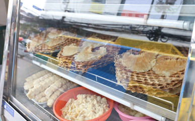 Raw dried shark fin in a showcase for sell at Bangrak, Bangkok, Thailand