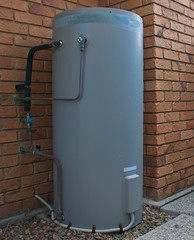 Hot water system outside a residential house.