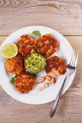 Salmon burgers with avocado salsa. Salmon cakes