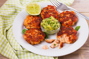 Salmon burgers with avocado salsa. Salmon cakes