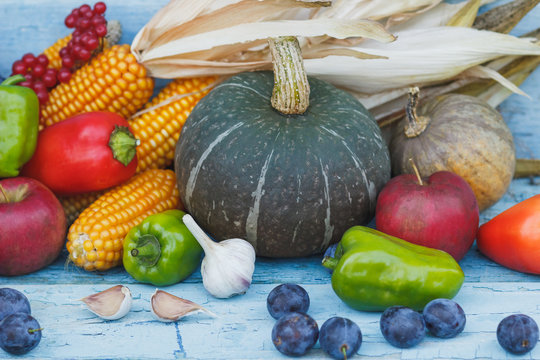 Pumpkin and different ripe vegetables and fruits