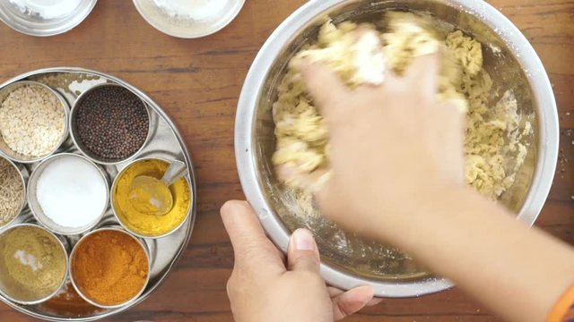 Top Angle shot- Flour mixing in Bowl
