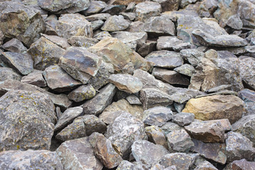 Heap of stones in the wild nature, background
