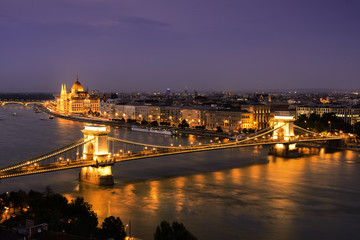 Fototapeta na wymiar Budapest, Hungary. Aerial view of Budapest, Hungary at sunset. View of Buda castle, Chain bridge and Parliament building at night