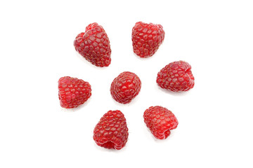 Raspberries in macro on the white background