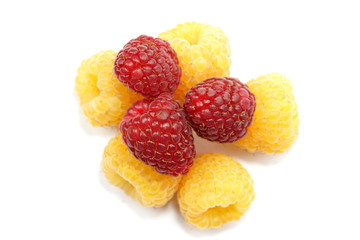 Raspberries in macro on the white background